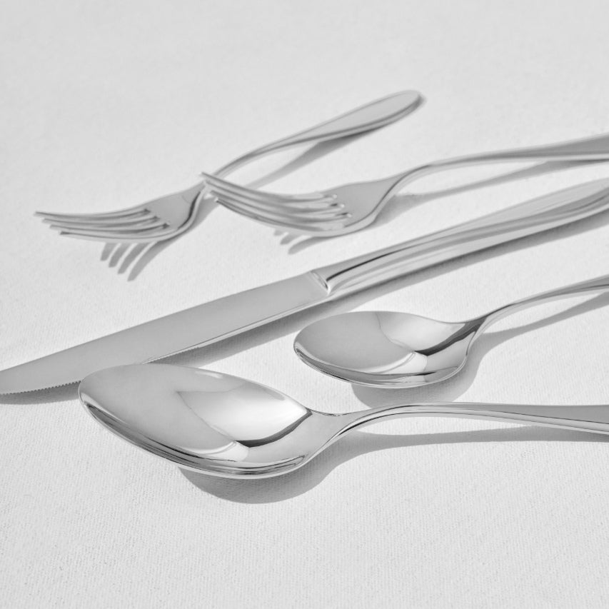 Classic stainless steel dinner spoon with forks and knife