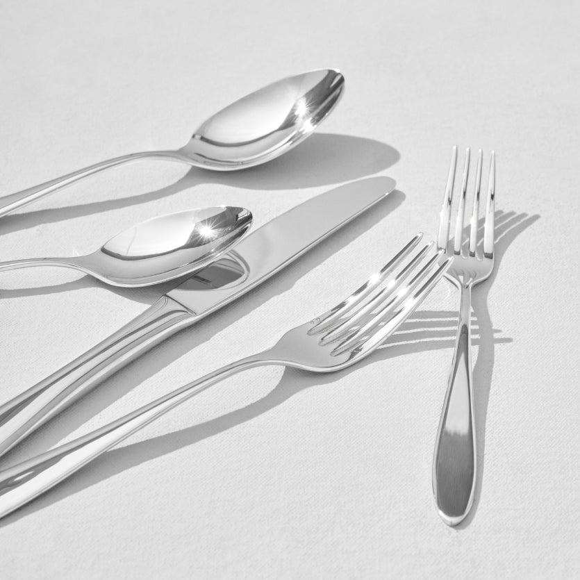 Close up of silver flatware pieces classic stainless steel