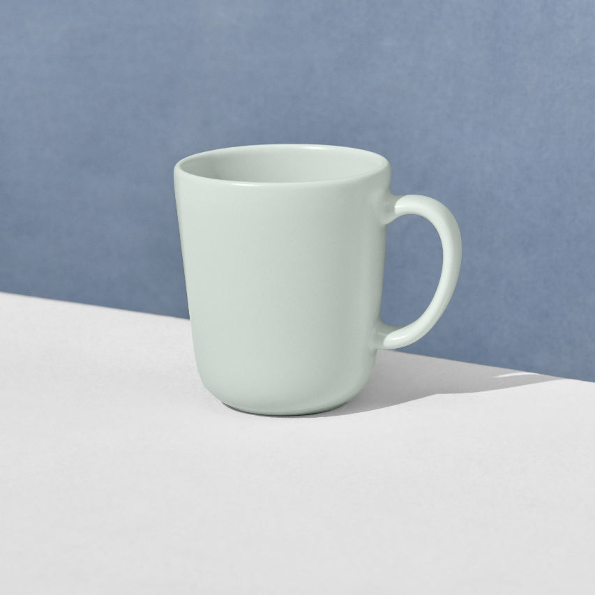 Angled view of single mint mug