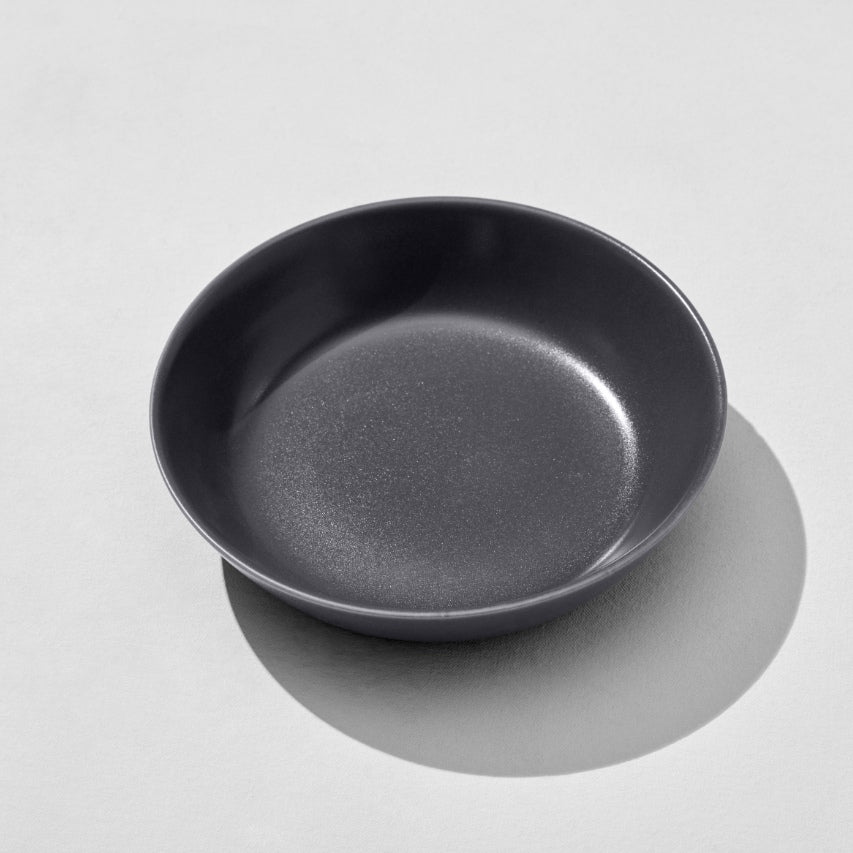 Overhead view of charcoal navy pasta bowl