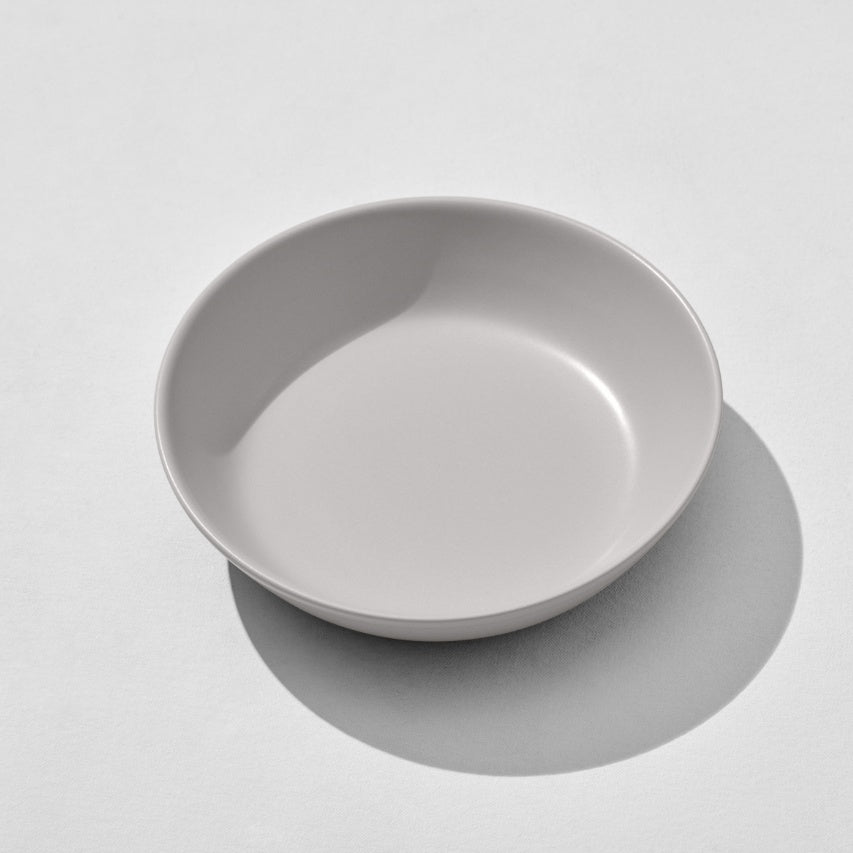 Overhead view of grey pasta bowl